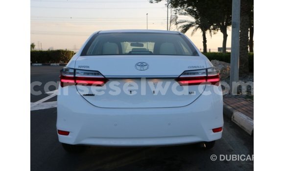 Acheter Import Voiture Toyota Corolla Blanc à Import - Dubai, East Mahé Acheter Import Voiture Toyota Corolla Blanc à Import - Dubai, East Mahé