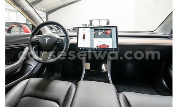 Buy Import Tesla Model 3 Red Car in Import - Dubai in East Mahé Buy Import Tesla Model 3 Red Car in Import - Dubai in East Mahé