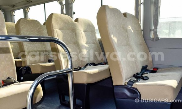Buy Import Toyota Coaster White Car in Import - Dubai in East Mahé Buy Import Toyota Coaster White Car in Import - Dubai in East Mahé