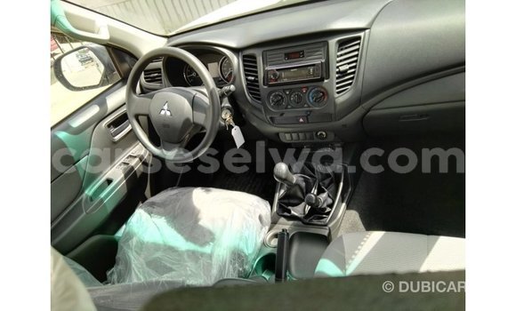 Buy Import Mitsubishi L200 White Car in Import - Dubai in East Mahé Buy Import Mitsubishi L200 White Car in Import - Dubai in East Mahé