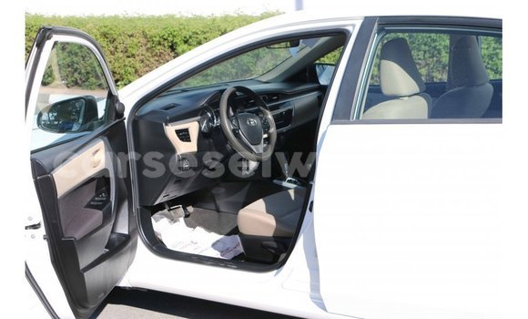 Acheter Import Voiture Toyota Corolla Blanc à Import - Dubai, East Mahé Acheter Import Voiture Toyota Corolla Blanc à Import - Dubai, East Mahé
