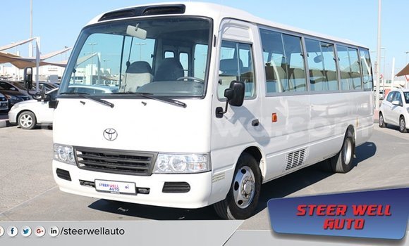 Acheter Import Voiture Toyota Coaster Blanc à Import - Dubai, East Mahé Acheter Import Voiture Toyota Coaster Blanc à Import - Dubai, East Mahé