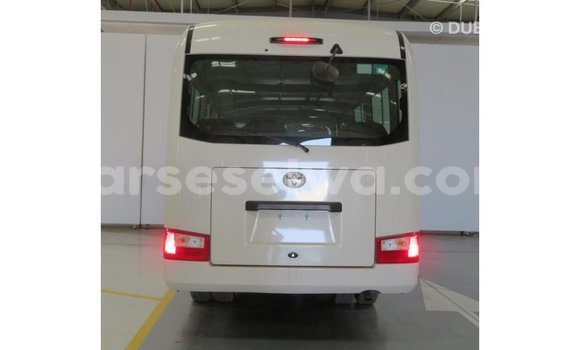 Acheter Import Voiture Toyota Coaster Blanc à Import - Dubai, East Mahé Acheter Import Voiture Toyota Coaster Blanc à Import - Dubai, East Mahé