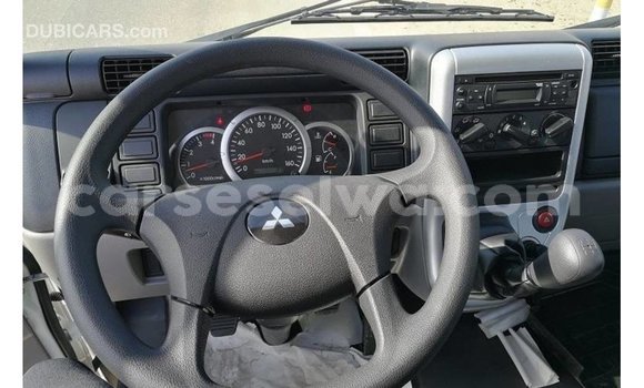 Buy Import Mitsubishi Carisma White Car in Import - Dubai in East Mahé Buy Import Mitsubishi Carisma White Car in Import - Dubai in East Mahé