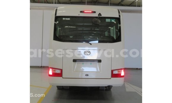 Acheter Import Voiture Toyota Coaster Blanc à Import - Dubai, East Mahé Acheter Import Voiture Toyota Coaster Blanc à Import - Dubai, East Mahé