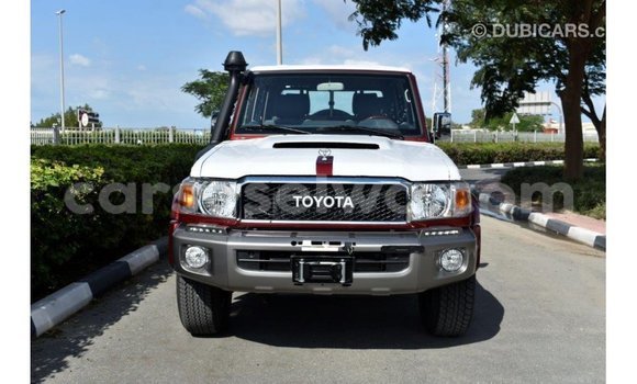 Buy Import Toyota Land Cruiser Red Car in Import - Dubai in East Mahé Buy Import Toyota Land Cruiser Red Car in Import - Dubai in East Mahé