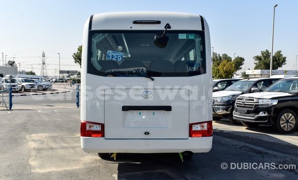 Acheter Import Voiture Toyota Coaster Blanc à Import - Dubai, East Mahé Acheter Import Voiture Toyota Coaster Blanc à Import - Dubai, East Mahé