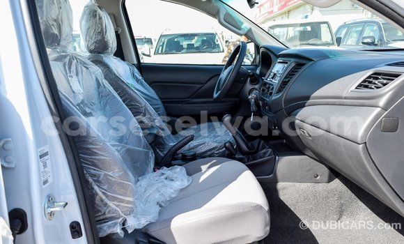 Acheter Import Voiture Mitsubishi L200 Blanc à Import - Dubai, East Mahé Acheter Import Voiture Mitsubishi L200 Blanc à Import - Dubai, East Mahé