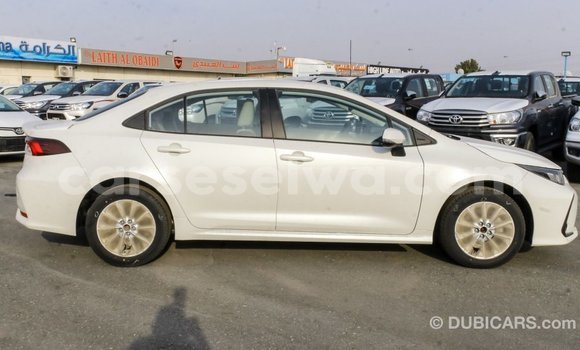 Buy Import Toyota Corolla White Car in Import - Dubai in East Mahé Buy Import Toyota Corolla White Car in Import - Dubai in East Mahé