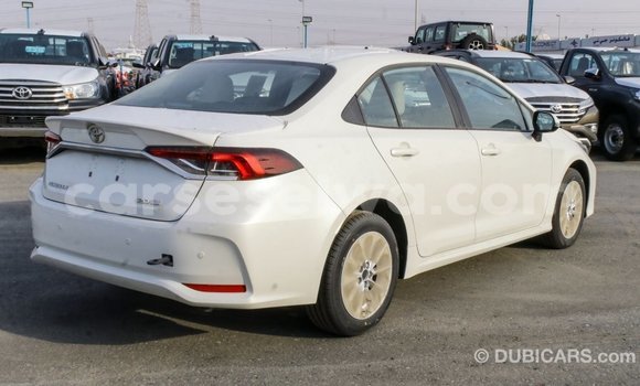 Buy Import Toyota Corolla White Car in Import - Dubai in East Mahé Buy Import Toyota Corolla White Car in Import - Dubai in East Mahé