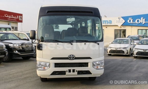Acheter Import Voiture Toyota Coaster Blanc à Import - Dubai, East Mahé Acheter Import Voiture Toyota Coaster Blanc à Import - Dubai, East Mahé