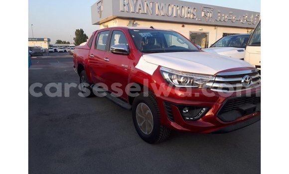 Buy Import Toyota Hilux Red Car in Import - Dubai in East Mahé Buy Import Toyota Hilux Red Car in Import - Dubai in East Mahé