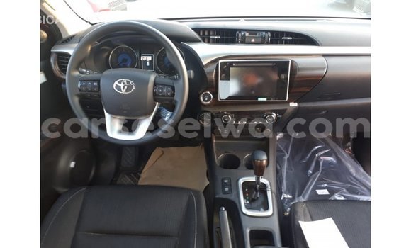 Buy Import Toyota Hilux Red Car in Import - Dubai in East Mahé Buy Import Toyota Hilux Red Car in Import - Dubai in East Mahé