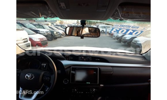 Buy Import Toyota Hilux Red Car in Import - Dubai in East Mahé Buy Import Toyota Hilux Red Car in Import - Dubai in East Mahé