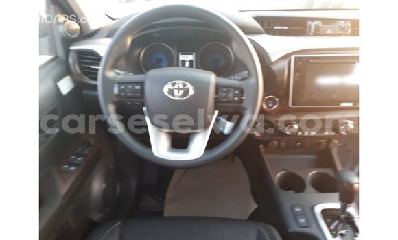 Buy Import Toyota Hilux Red Car in Import - Dubai in East Mahé Buy Import Toyota Hilux Red Car in Import - Dubai in East Mahé