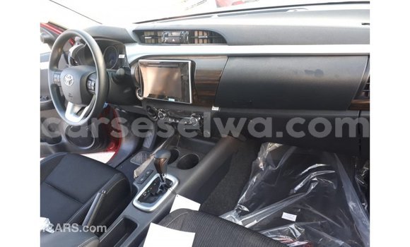 Buy Import Toyota Hilux Red Car in Import - Dubai in East Mahé Buy Import Toyota Hilux Red Car in Import - Dubai in East Mahé