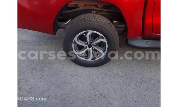 Buy Import Toyota Hilux Red Car in Import - Dubai in East Mahé Buy Import Toyota Hilux Red Car in Import - Dubai in East Mahé