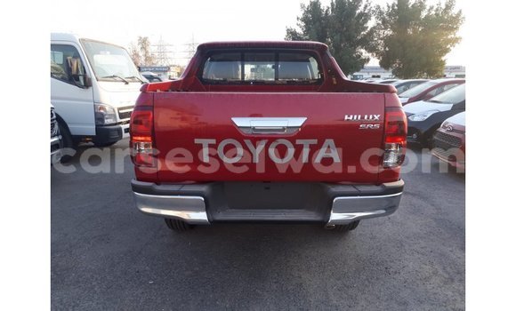 Buy Import Toyota Hilux Red Car in Import - Dubai in East Mahé Buy Import Toyota Hilux Red Car in Import - Dubai in East Mahé