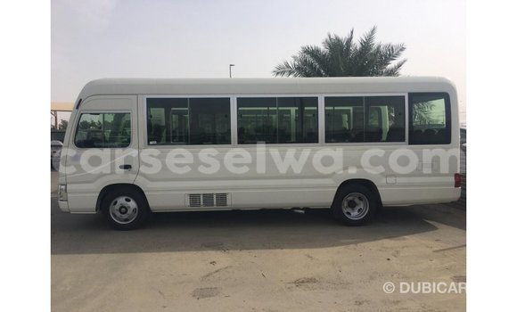 Acheter Import Voiture Toyota Coaster Blanc à Import - Dubai, East Mahé Acheter Import Voiture Toyota Coaster Blanc à Import - Dubai, East Mahé