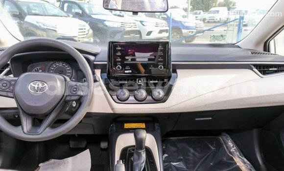 Acheter Import Voiture Toyota Corolla Blanc à Import - Dubai, East Mahé Acheter Import Voiture Toyota Corolla Blanc à Import - Dubai, East Mahé