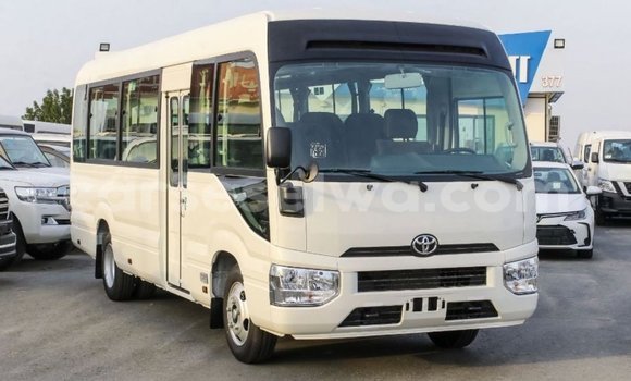 Acheter Import Voiture Toyota Coaster Blanc à Import - Dubai, East Mahé Acheter Import Voiture Toyota Coaster Blanc à Import - Dubai, East Mahé