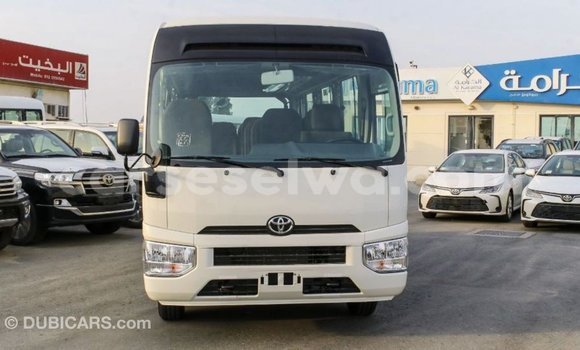 Acheter Import Voiture Toyota Coaster Blanc à Import - Dubai, East Mahé Acheter Import Voiture Toyota Coaster Blanc à Import - Dubai, East Mahé