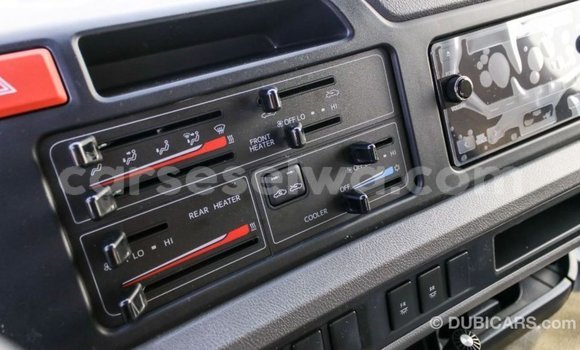 Acheter Import Voiture Toyota Coaster Blanc à Import - Dubai, East Mahé Acheter Import Voiture Toyota Coaster Blanc à Import - Dubai, East Mahé