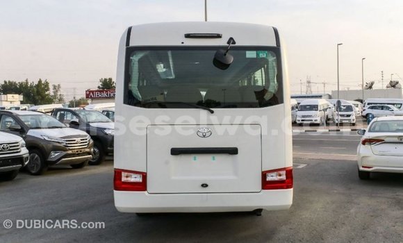 Acheter Import Voiture Toyota Coaster Blanc à Import - Dubai, East Mahé Acheter Import Voiture Toyota Coaster Blanc à Import - Dubai, East Mahé