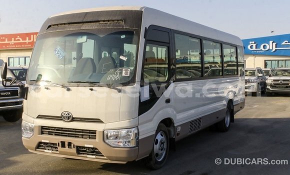 Acheter Import Voiture Toyota Coaster Blanc à Import - Dubai, East Mahé Acheter Import Voiture Toyota Coaster Blanc à Import - Dubai, East Mahé
