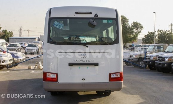 Acheter Import Voiture Toyota Coaster Blanc à Import - Dubai, East Mahé Acheter Import Voiture Toyota Coaster Blanc à Import - Dubai, East Mahé