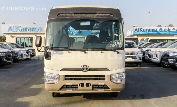 Acheter Import Voiture Toyota Coaster Blanc à Import - Dubai, East Mahé Acheter Import Voiture Toyota Coaster Blanc à Import - Dubai, East Mahé
