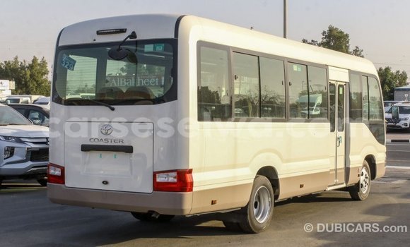 Acheter Import Voiture Toyota Coaster Blanc à Import - Dubai, East Mahé Acheter Import Voiture Toyota Coaster Blanc à Import - Dubai, East Mahé