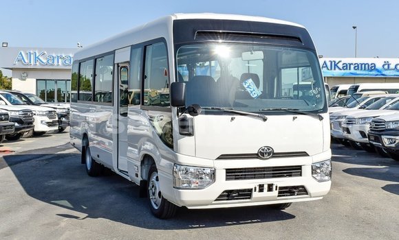Acheter Import Voiture Toyota Coaster Blanc à Import - Dubai, East Mahé Acheter Import Voiture Toyota Coaster Blanc à Import - Dubai, East Mahé