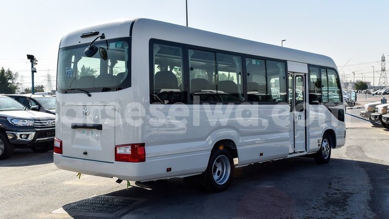 Big with watermark toyota coaster east mahe import dubai 6503