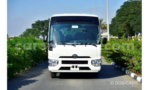 Acheter Import Voiture Toyota Coaster Blanc à Import - Dubai, East Mahé Acheter Import Voiture Toyota Coaster Blanc à Import - Dubai, East Mahé