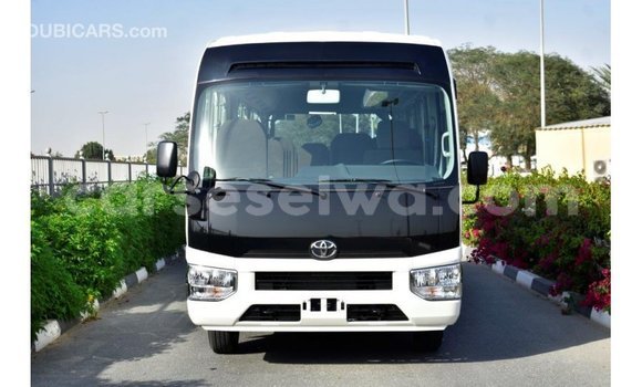 Acheter Import Voiture Toyota Coaster Blanc à Import - Dubai, East Mahé Acheter Import Voiture Toyota Coaster Blanc à Import - Dubai, East Mahé