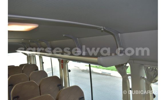 Acheter Import Voiture Toyota Coaster Blanc à Import - Dubai, East Mahé Acheter Import Voiture Toyota Coaster Blanc à Import - Dubai, East Mahé
