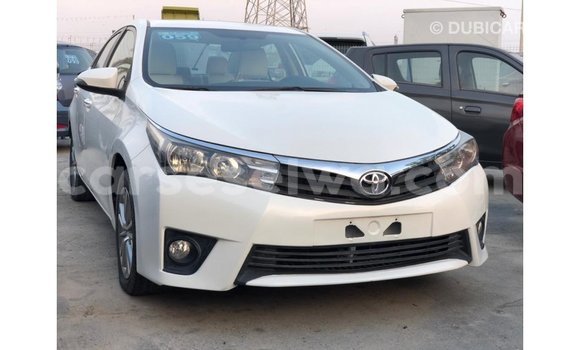 Buy Import Toyota Corolla White Car in Import - Dubai in East Mahé Buy Import Toyota Corolla White Car in Import - Dubai in East Mahé
