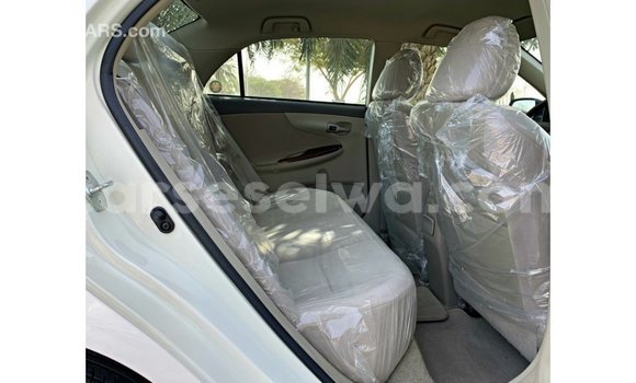 Buy Import Toyota Corolla White Car in Import - Dubai in East Mahé Buy Import Toyota Corolla White Car in Import - Dubai in East Mahé