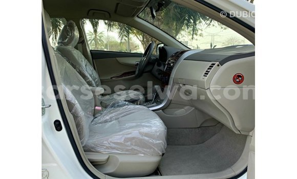 Buy Import Toyota Corolla White Car in Import - Dubai in East Mahé Buy Import Toyota Corolla White Car in Import - Dubai in East Mahé