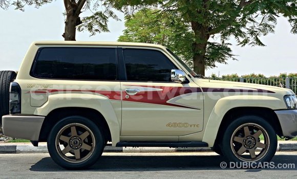 Buy Import Nissan Patrol Beige Car in Import - Dubai in East Mahé Buy Import Nissan Patrol Beige Car in Import - Dubai in East Mahé