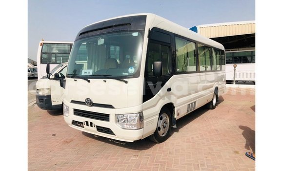 Buy Import Toyota Coaster White Car in Import - Dubai in East Mahé
