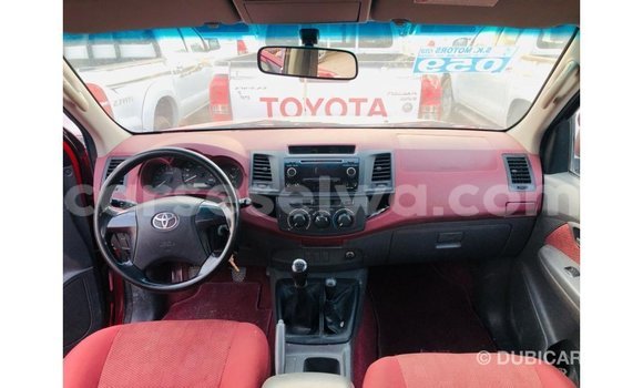 Buy Import Toyota Hilux Red Car in Import - Dubai in East Mahé Buy Import Toyota Hilux Red Car in Import - Dubai in East Mahé