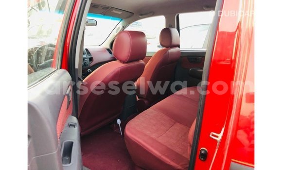 Buy Import Toyota Hilux Red Car in Import - Dubai in East Mahé Buy Import Toyota Hilux Red Car in Import - Dubai in East Mahé