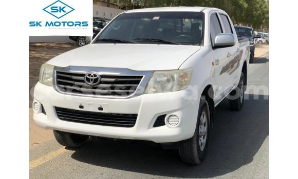 Buy Import Toyota Hilux White Car in Import - Dubai in East Mahé