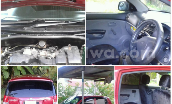 Buy Used Kia Carens Red Car in Beau Vallon in North Mahé Buy Used Kia Carens Red Car in Beau Vallon in North Mahé
